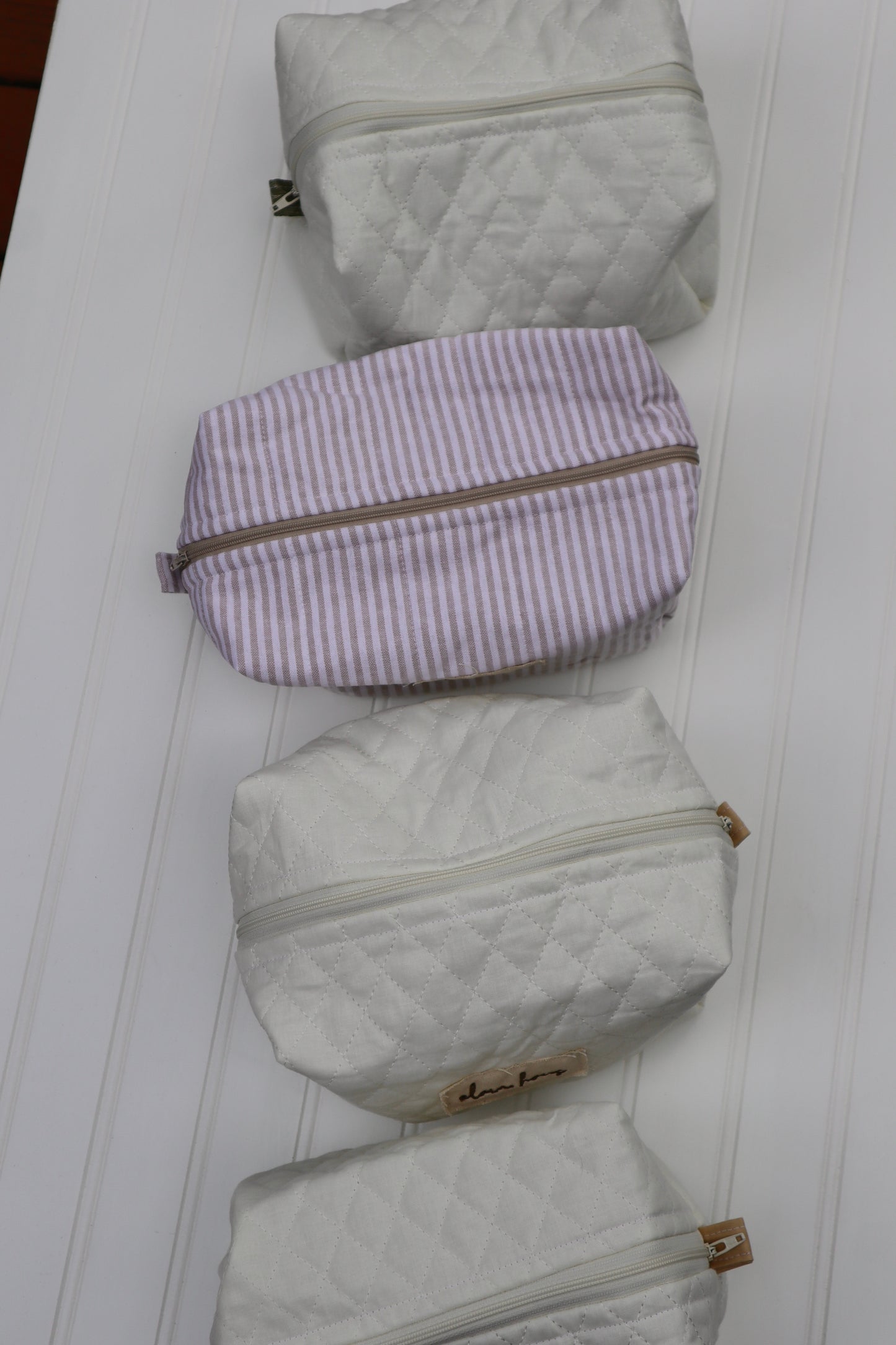 Beige Striped Toiletry Bag