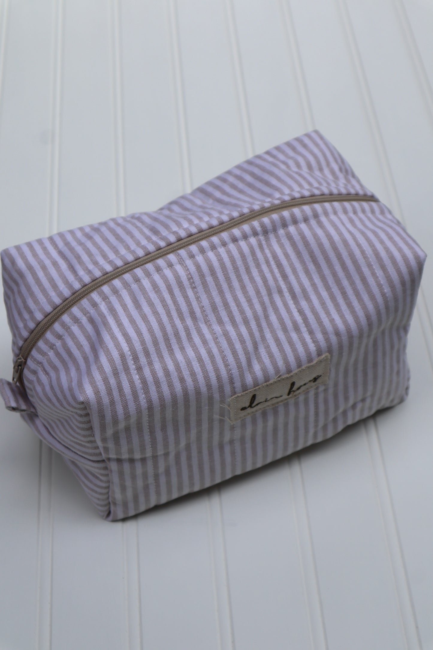Beige Striped Toiletry Bag