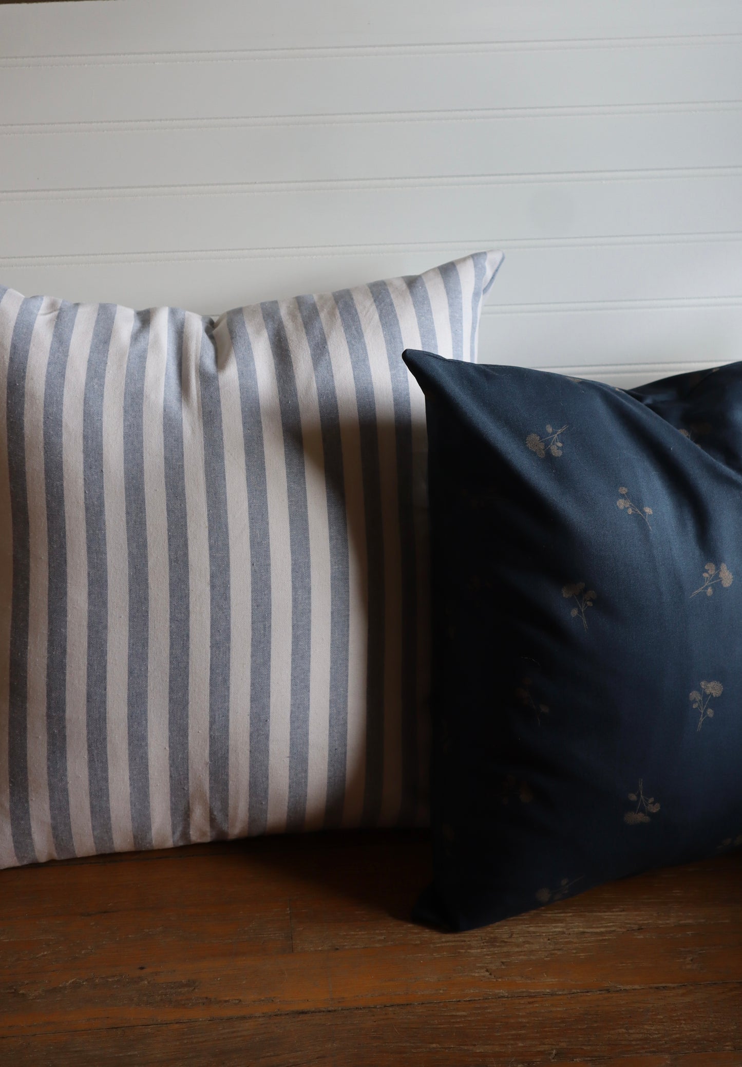 blue pin striped throw pillow