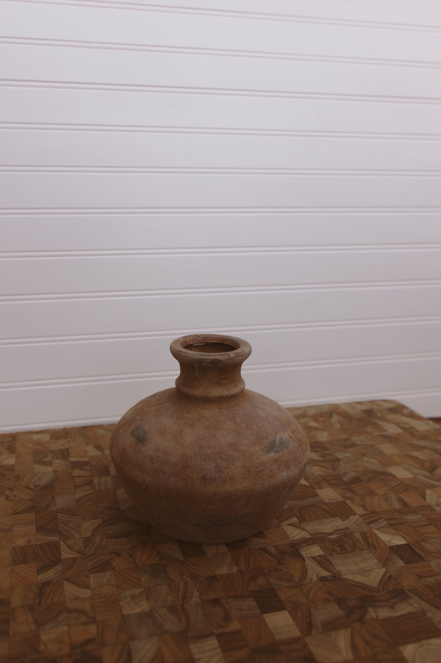 distressed ceramic vessel