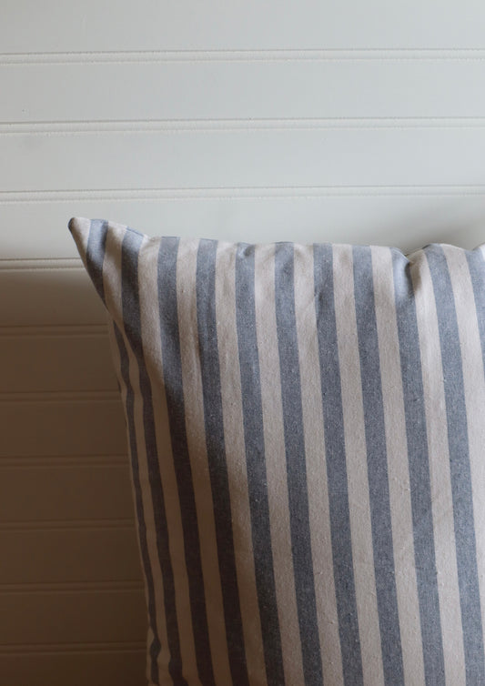 blue pin striped throw pillow